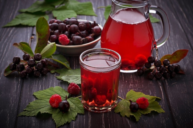 Fresh berry drink with black currant and raspberries. Selective focus