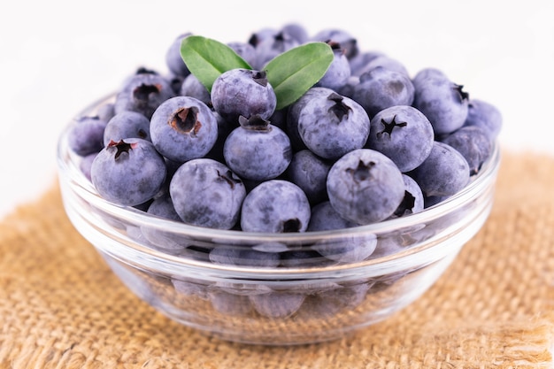 Fresh blueberries in a glass bowl Closeup