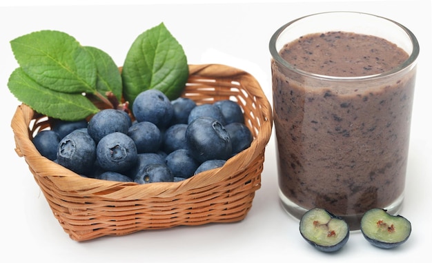 Fresh blueberries and juice in a glass