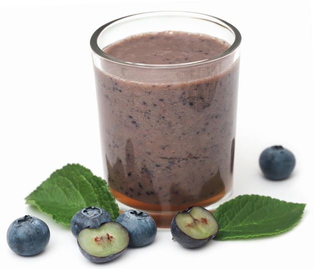 Fresh blueberries and juice in a glass