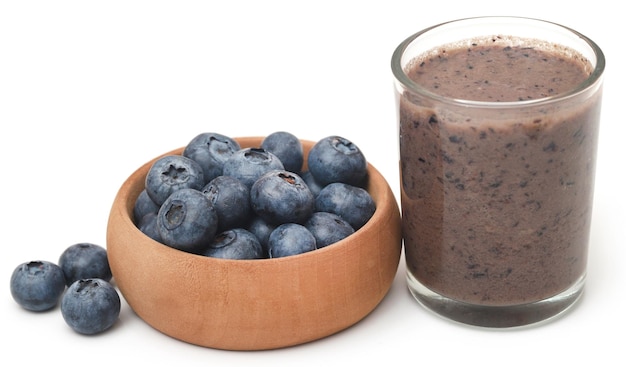 Fresh blueberries and juice in a glass