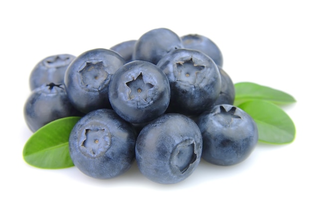 Fresh blueberries with leafs on white background