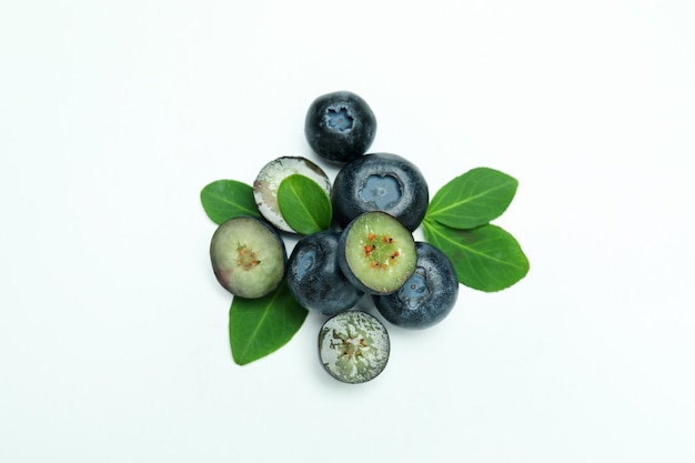 Fresh blueberry with leaves on white background