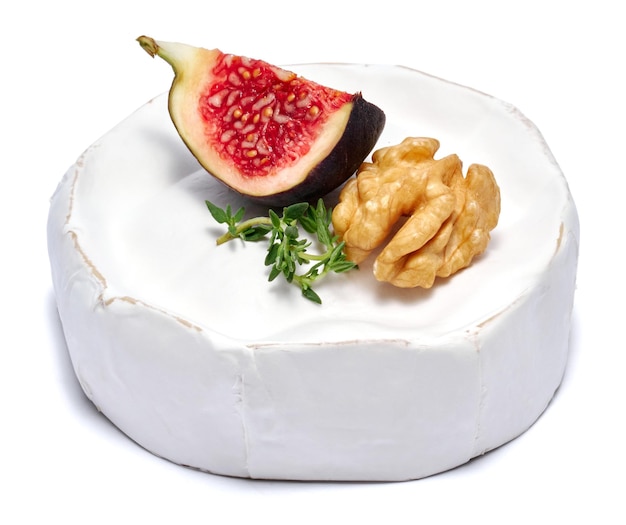 Fresh brie or camembert cheese isolated on a white background