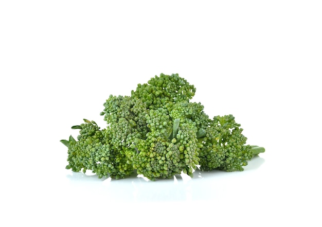 Fresh broccoli on white wall