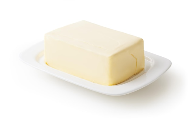 Fresh butter on white butter dish isolated on white background with clipping path