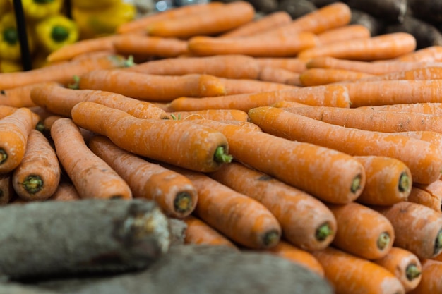 Fresh carrots in the supermarket Vegetables and fruits exposed for the consumer to choose