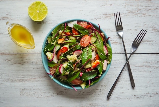 Fresh Chard Salad with quinoa and tomatoes. Organic vegetables.