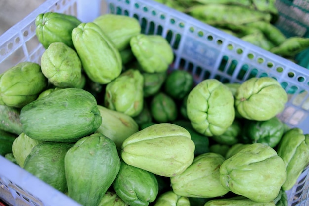 Fresh chayote fruits (Sechium edulis) on basket