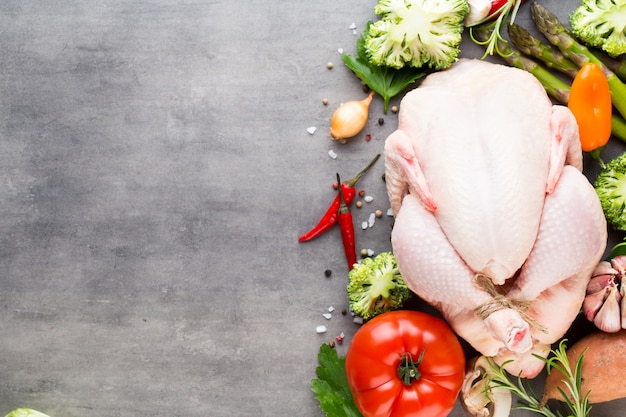 Fresh chicken  meat and vegetables. Flat lay.