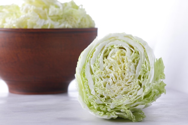 Fresh chinese cabbage isolated on white background Chinese cabbage salad preparation Organic vegetables Closeup