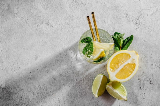 Fresh citrus lemonade with limes, lemons and mint. Summer drinks.