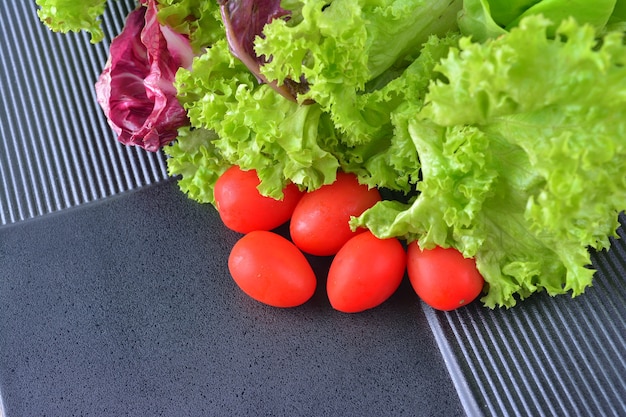 Fresh Close up Tomato cherry with lettuce salad