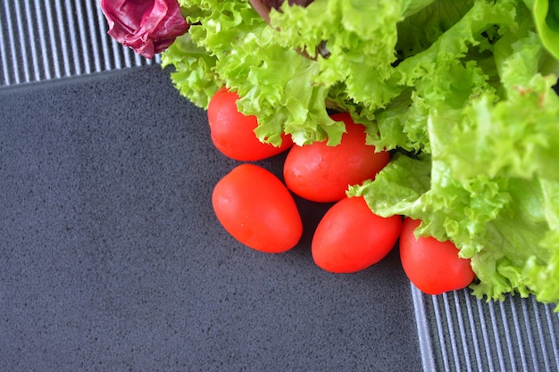 Fresh Close up Tomato cherry with lettuce salad