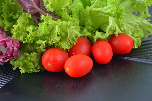 Fresh Close up Tomato cherry with lettuce salad