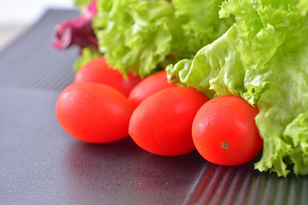 Fresh Close up Tomato cherry with lettuce salad