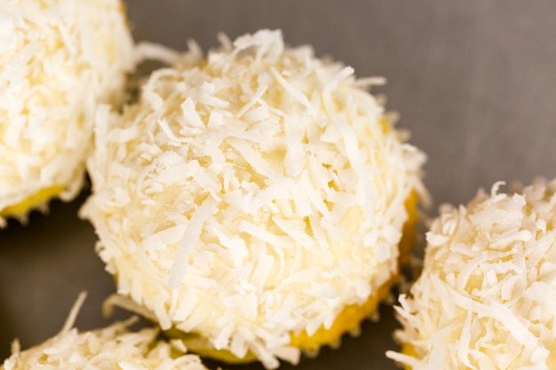 Fresh coconut cupcakes on the tray.