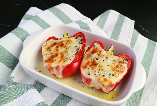 Fresh Cooked Mouthwatering Stuffed Bell Peppers on Kitchen Table