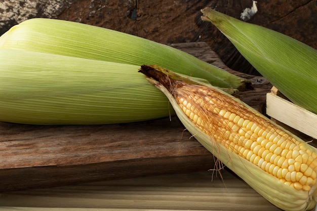 Fresh corn on cutting board