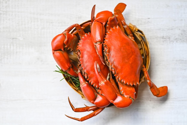 Fresh crab on wooden steamer seafood crab cooking food steamed crab red in the seafood restaurant kitchen top view