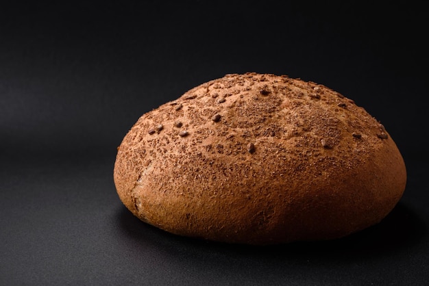 Fresh crispy brown bread with sesame seeds and spices