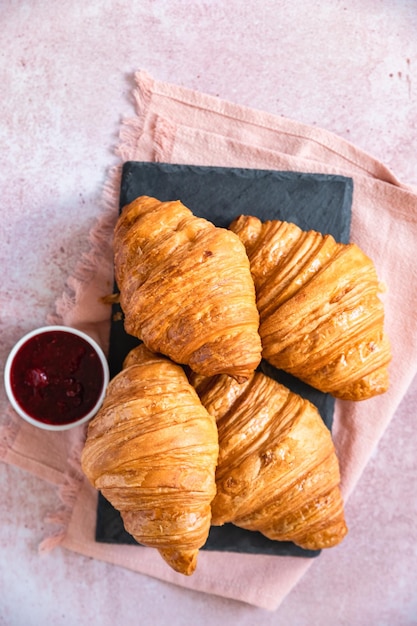 Fresh crispy croissants with jam French croissant Homemade bakery for tasty breakfast