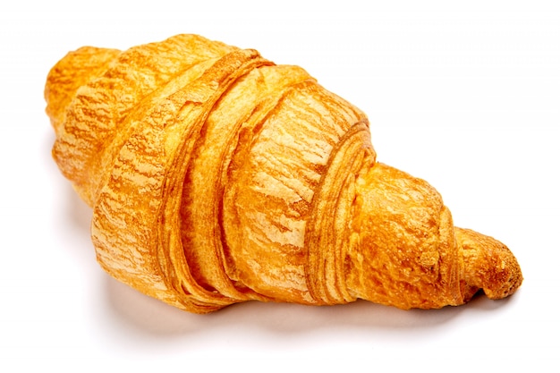 Fresh croissant on white background