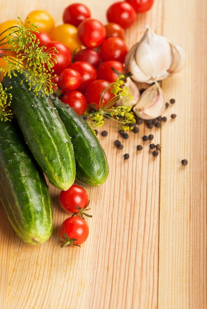 Fresh cucumbers tomatoes of cherry and fennel branch