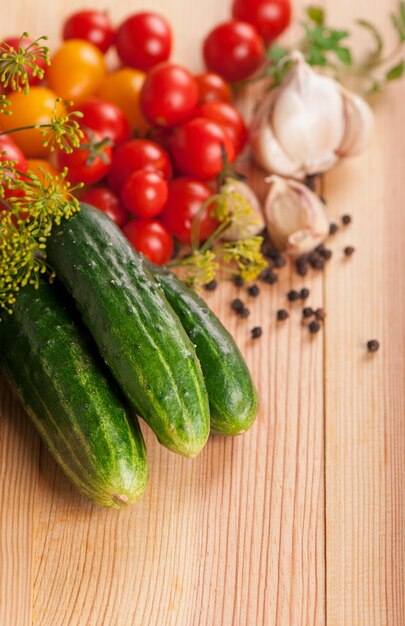 Fresh cucumbers tomatoes of cherry and fennel branch