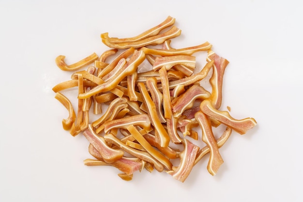 Fresh deli pig ears isolated on white background