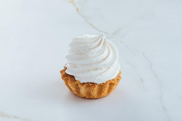 Fresh delicious desserts on a light background