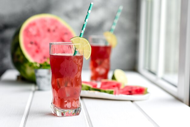 Fresh delicious watermelon slices with juice on the table