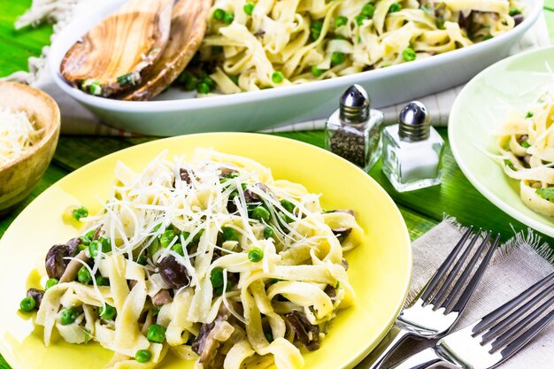 Fresh fettuccine with creamy mushroom sauce.