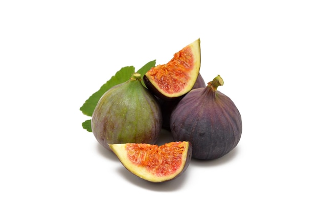 fresh fig fruits and figs in a cut isolated on white