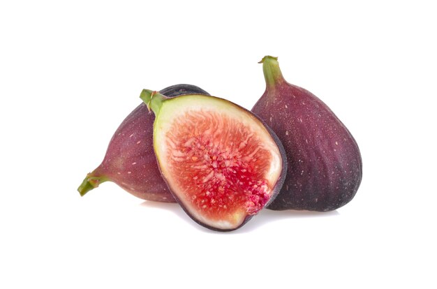 Fresh figs - fruits with half isolated on a white background.