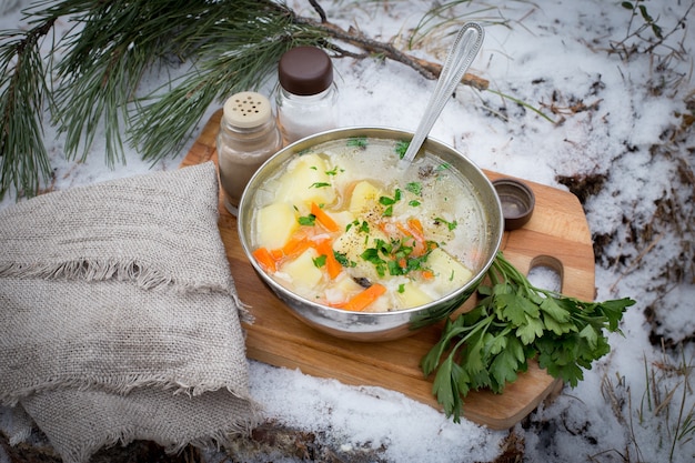 Fresh fish soup with spices, cooked over a fire. Taken on the nature of the fish soup.