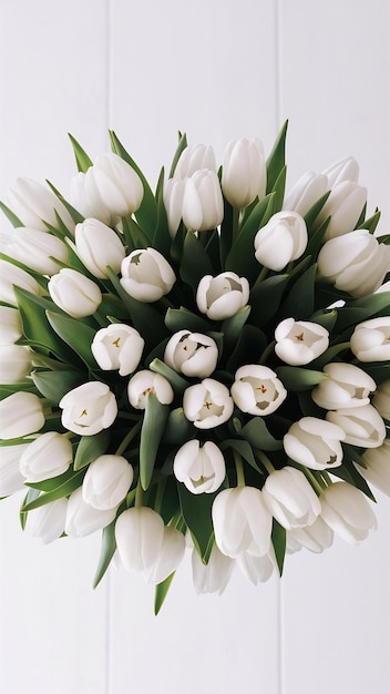 Fresh flowers tulips in a white bed top view copy space