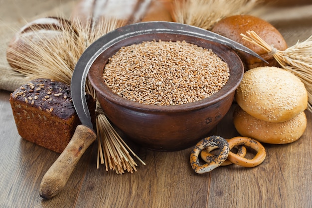 Fresh fragrant baked bread on an old background.