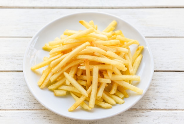 Fresh french fries on white plate delicious Italian meny homemade ingredients - Tasty potato fries for food or snack