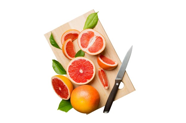 Photo fresh fruit grapefruit slices isolated on white background top view copy space creative summer concept half of citrus in minimal flat lay with copy space