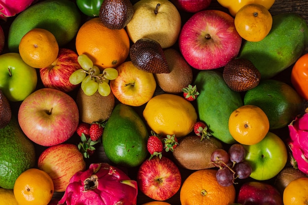 Fresh fruits Assorted fruits colorful clean eating Fruit background Helathy concept Top View