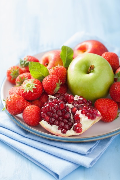 Fresh fruits and berries. strawberry, apple, pomegranate