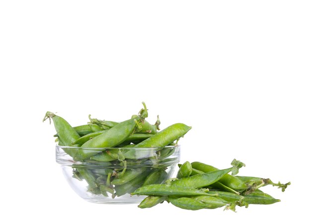 Fresh garden peas in a glass bowl