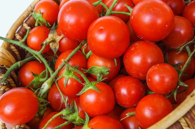 Fresh garden tomato in a basket