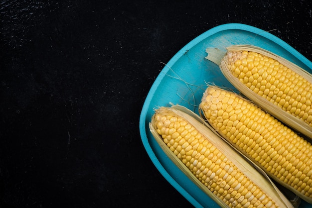 Fresh golden yellow corn cob