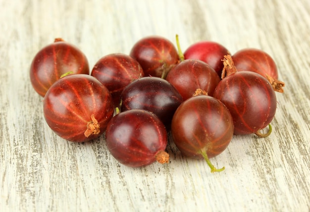 Fresh gooseberries on table closeup