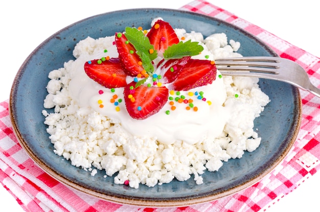 Fresh granulated cottage cheese with strawberries. 