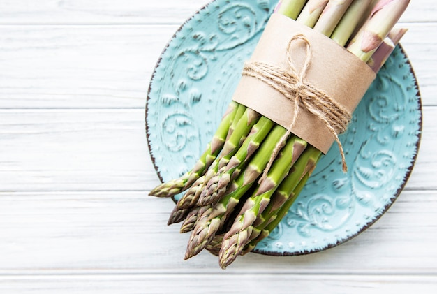 Fresh green asparagus  on  wooden table