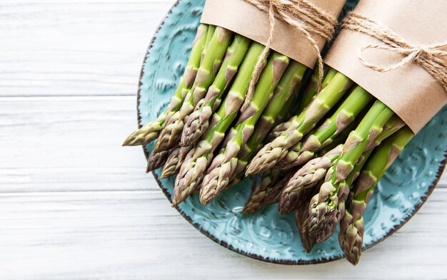 Fresh green asparagus  on  wooden table