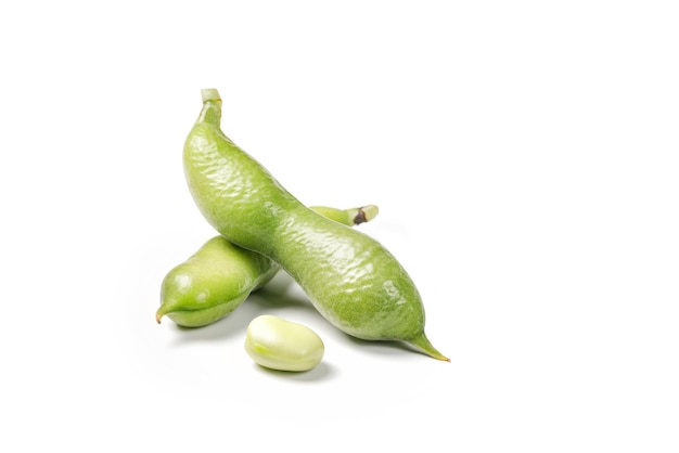 Fresh green beans in a green pod isolated on white background String beans with clipping path